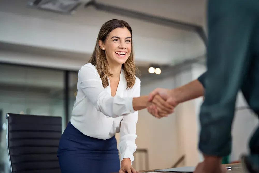 business woman shaking hands